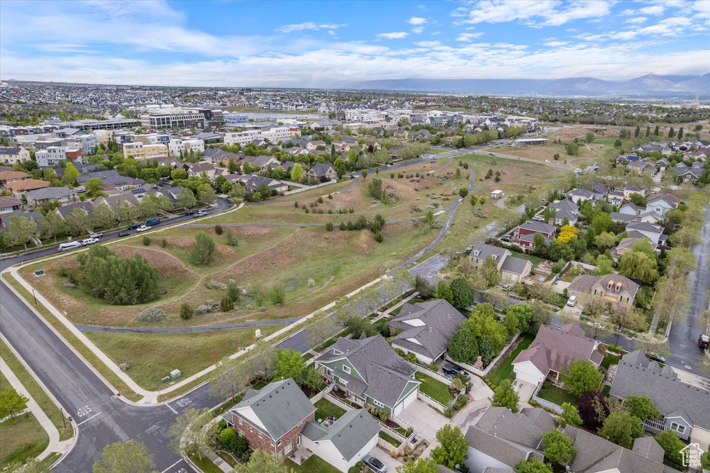View of property location with a mountainous background and nearby suburban area