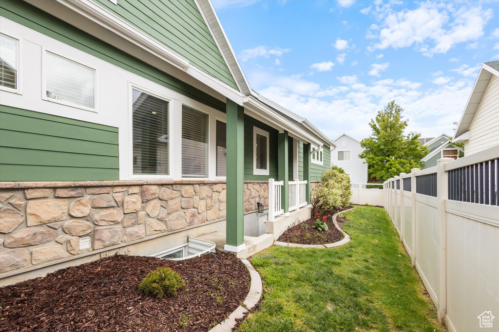 View of home's exterior with stone siding