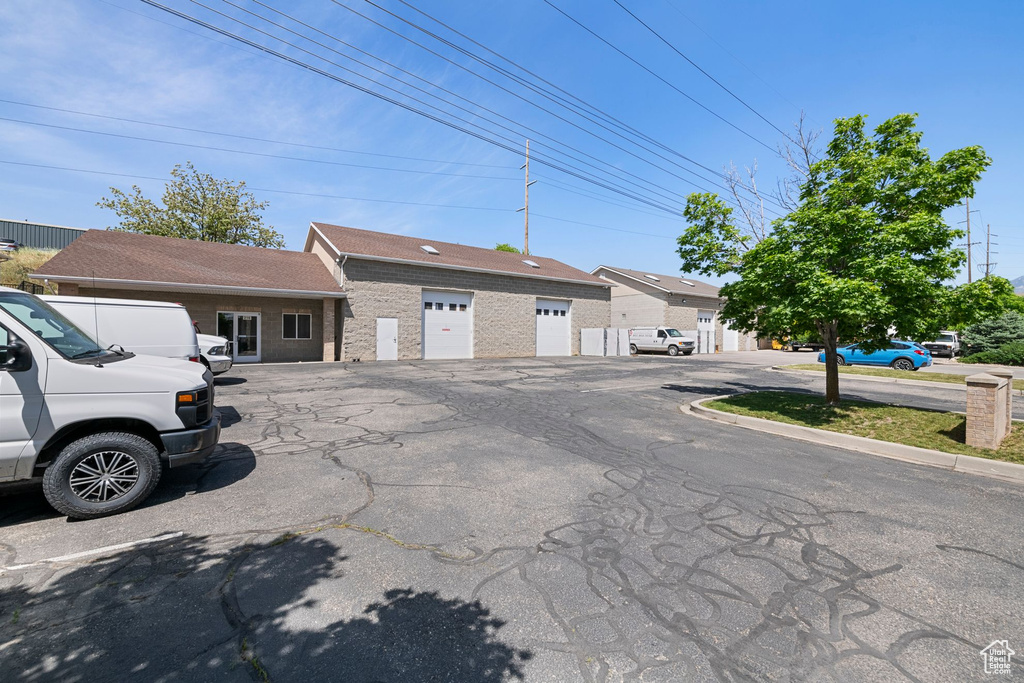 Townhome / multi-family property with brick siding