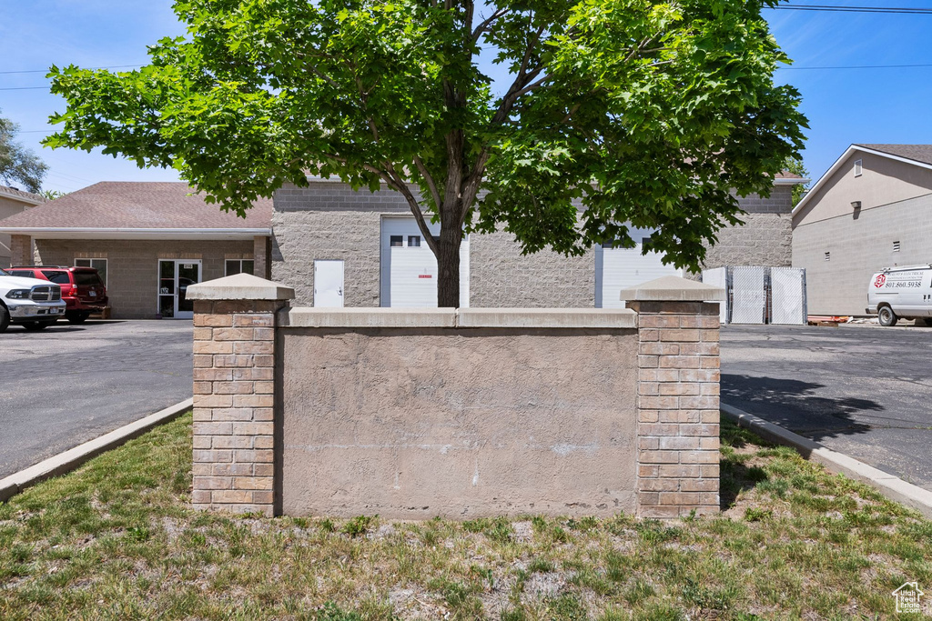 Community / neighborhood sign with fence