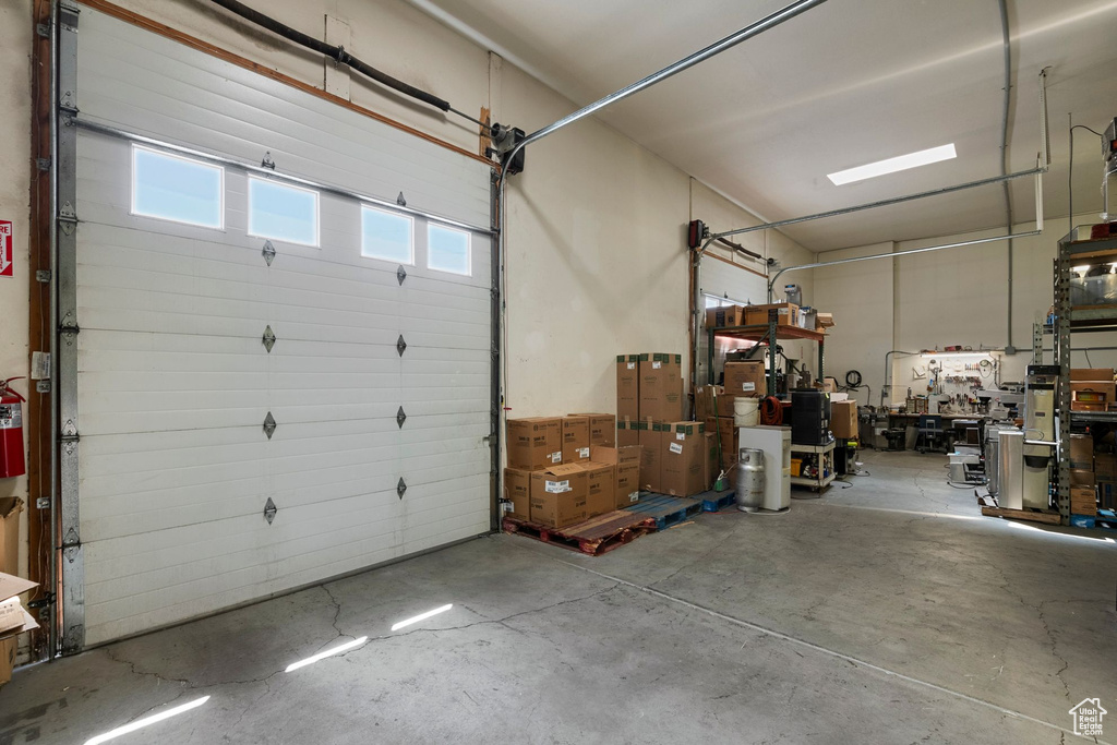 Garage featuring a workshop area