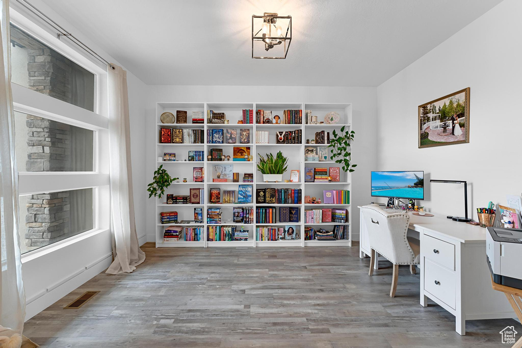 Office area featuring wood finished floors