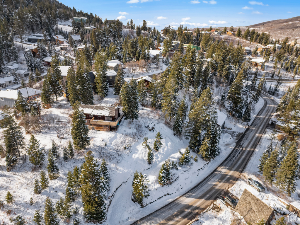 Snowy aerial view with a mountain view