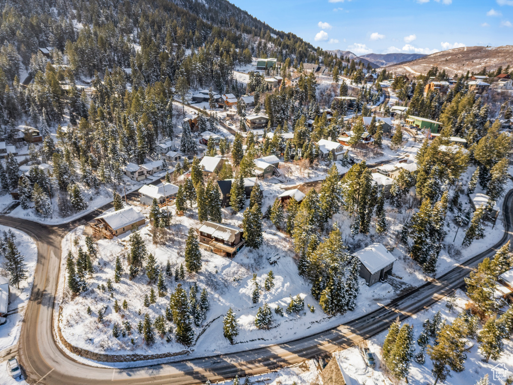 Snowy aerial view with a mountain view
