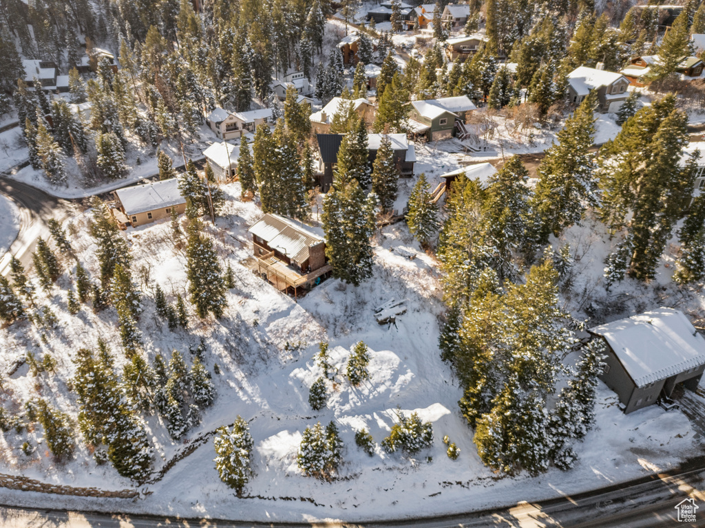 Snowy aerial view with a residential view