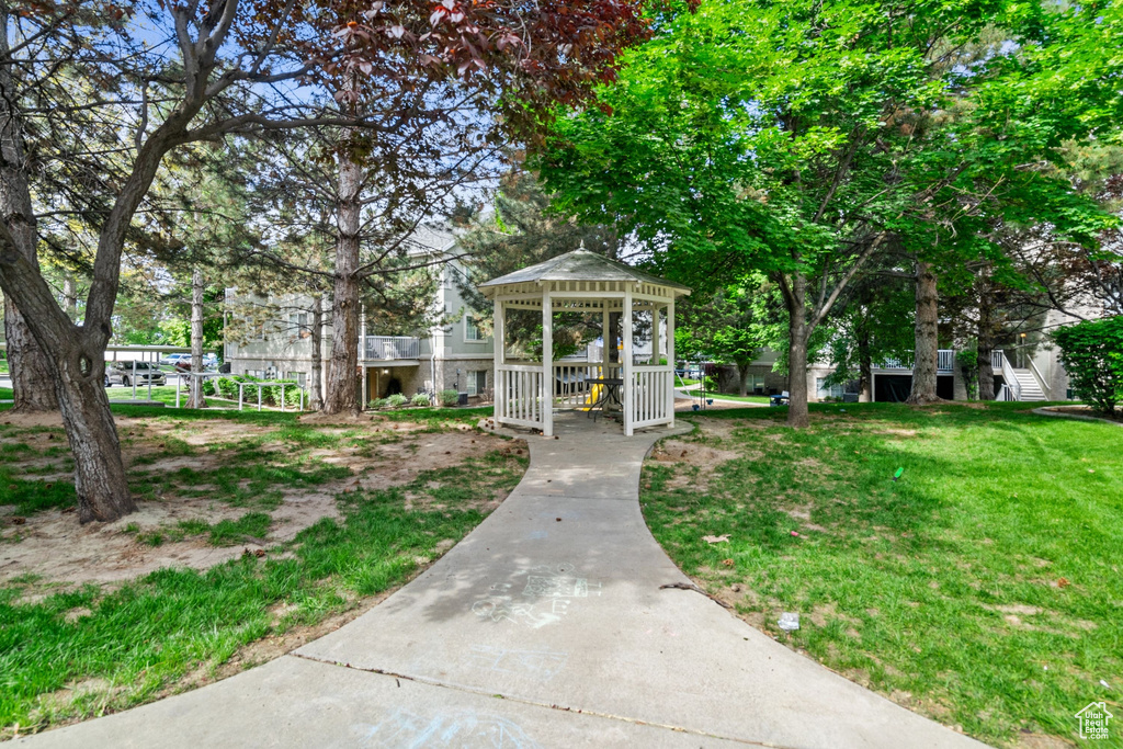 Surrounding community featuring a gazebo and a yard