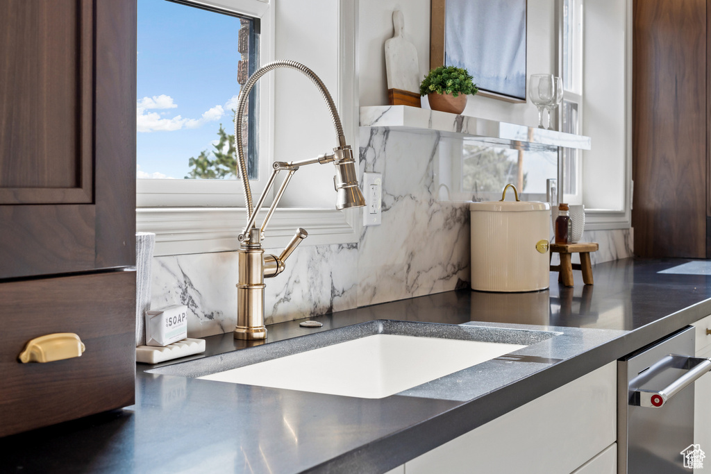 Detailed view of a sink and backsplash