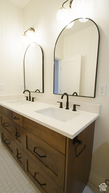 Bathroom featuring double vanity