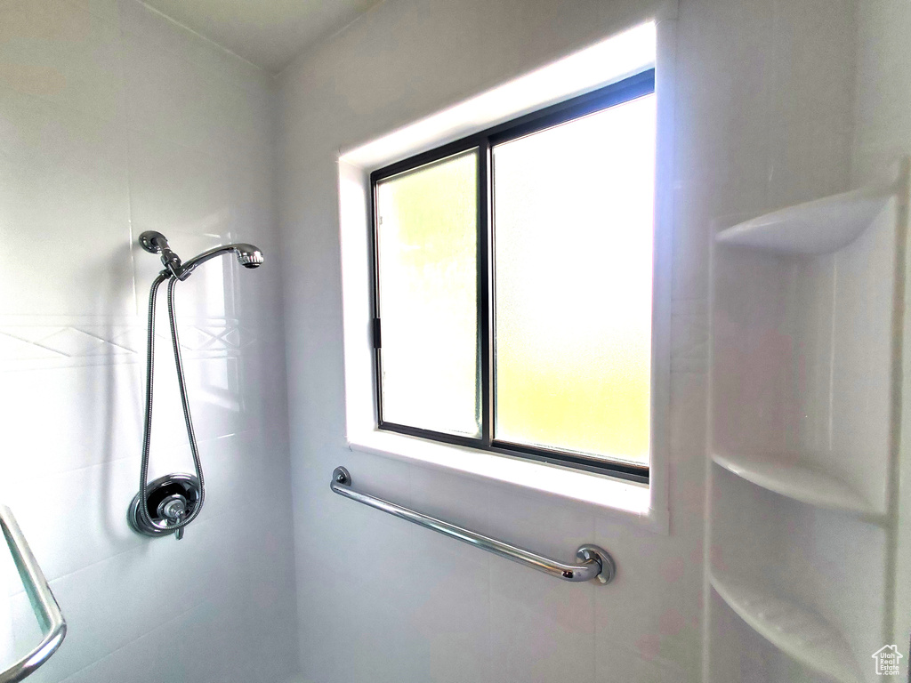 Bathroom with tiled shower