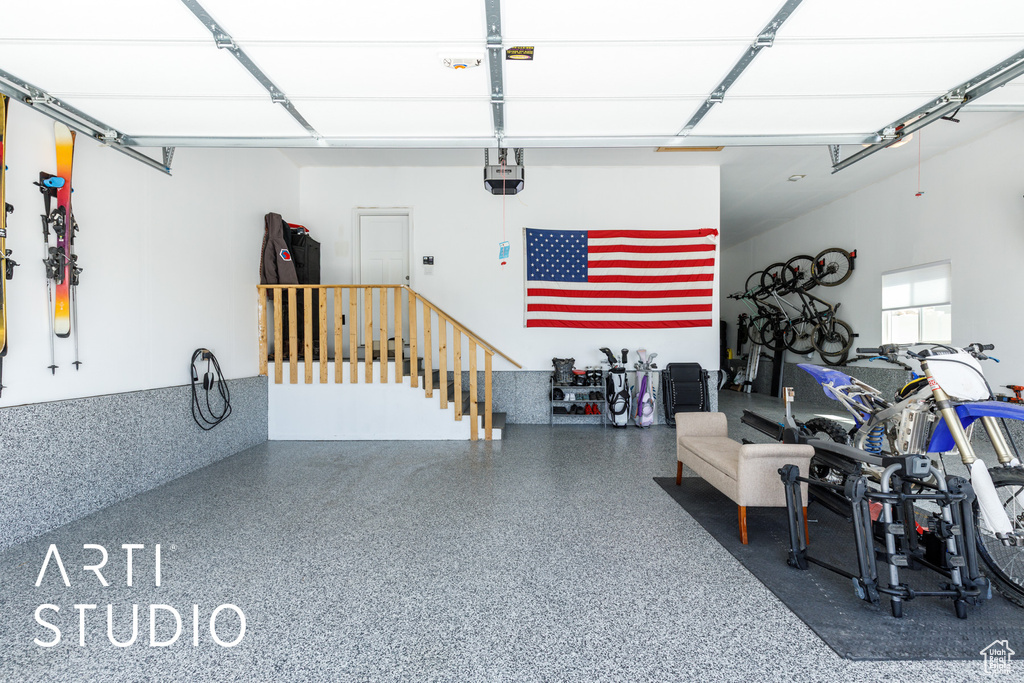 Garage featuring a garage door opener