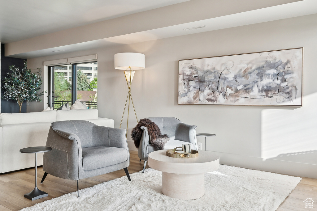 Living area with wood finished floors