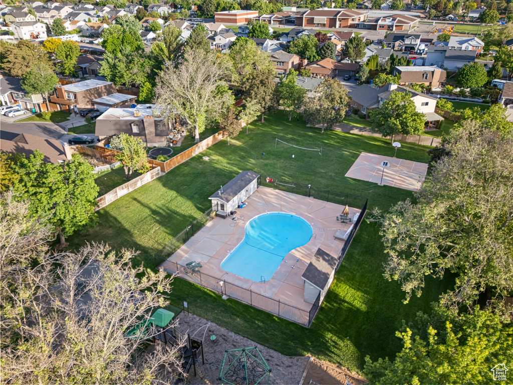View of property location with nearby suburban area and a pool