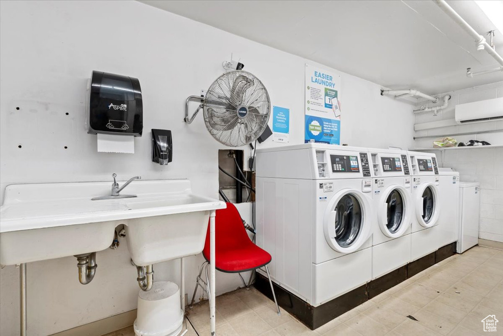 Shared laundry featuring washer and dryer