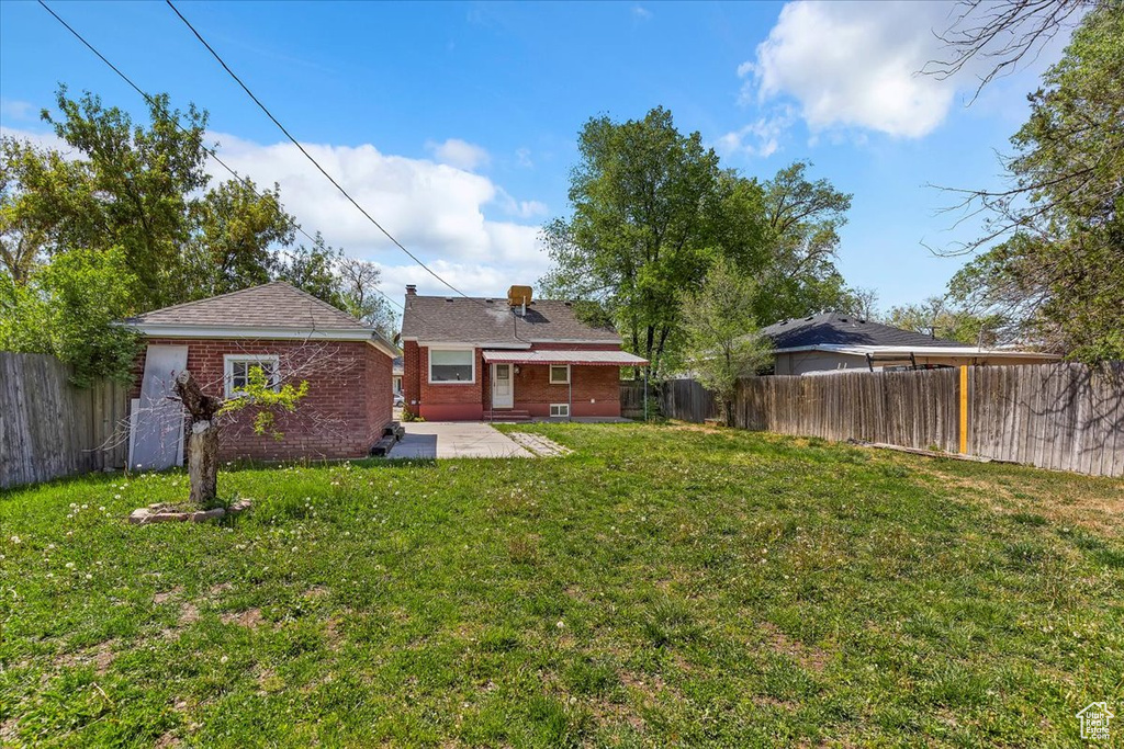 View of yard with a patio
