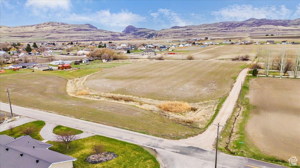 Aerial view of residential area featuring mountains