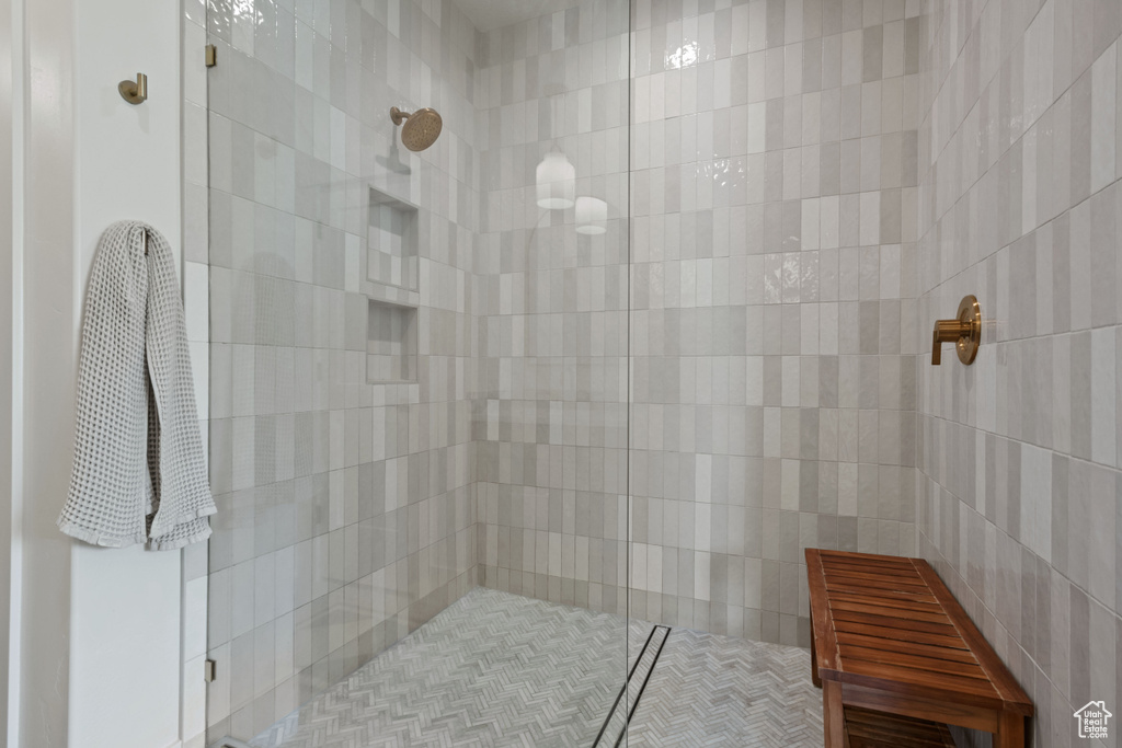Full bathroom with tiled shower