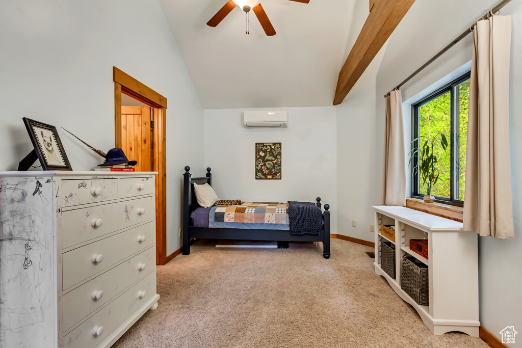 Bedroom with a wall unit AC, light carpet, baseboards, lofted ceiling, and a ceiling fan