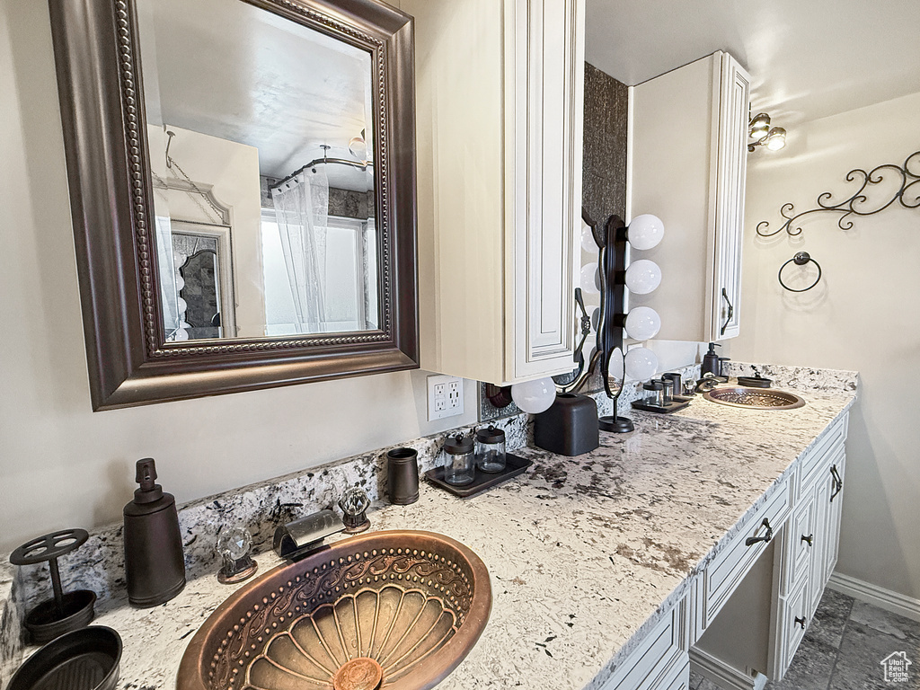 Full bathroom with double vanity