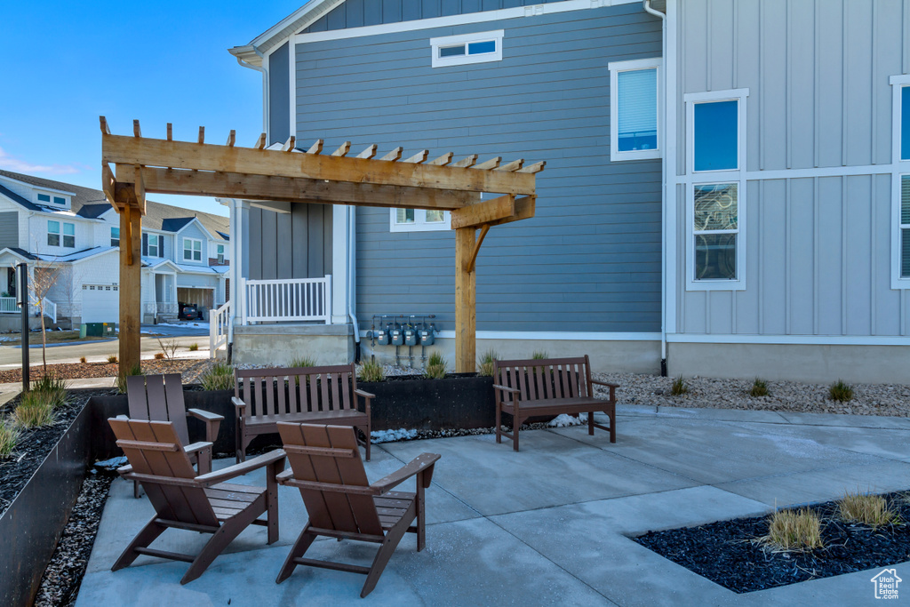 View of patio / terrace featuring a residential view and a pergola