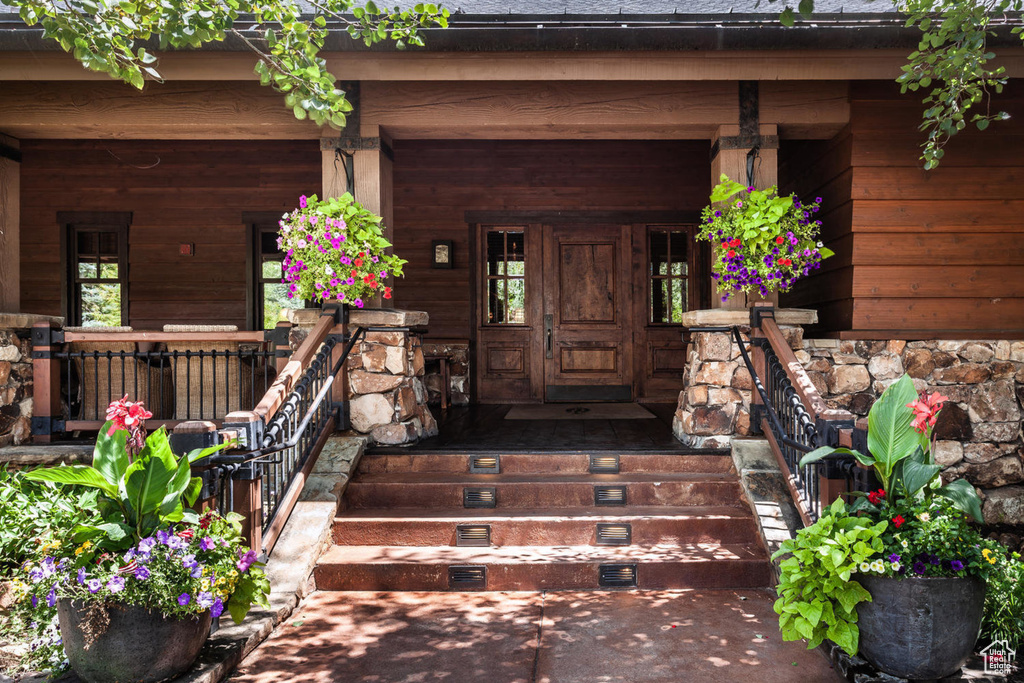 Property entrance featuring covered porch