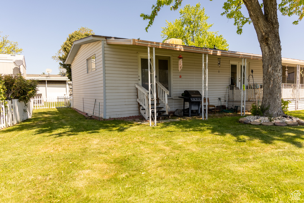 Back of house featuring entry steps