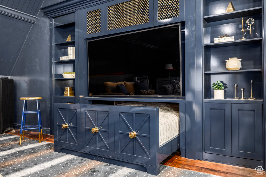 Detailed view of built in features and wood finished floors