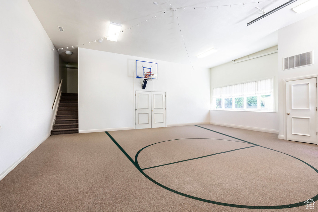 View of basketball court featuring basketball court