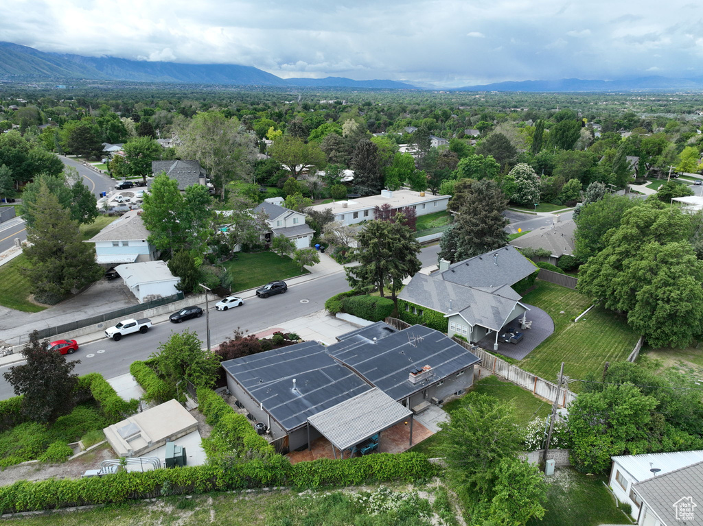 Aerial perspective of suburban area featuring mountains