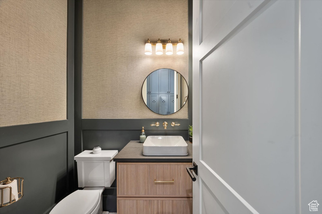 Half bath with toilet and vanity