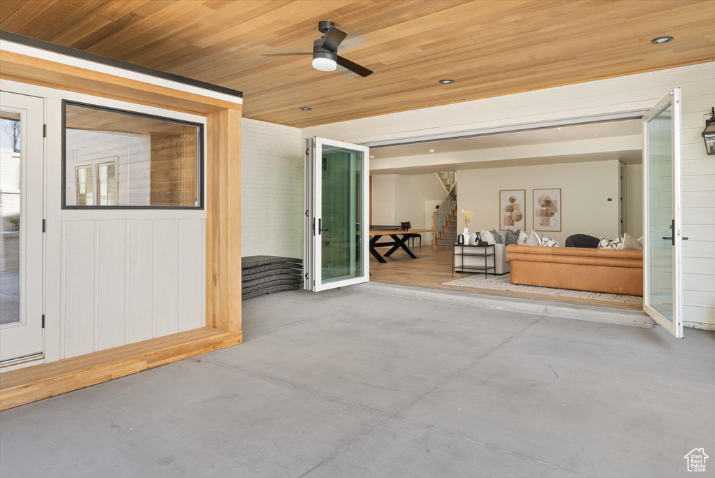 View of patio featuring a ceiling fan