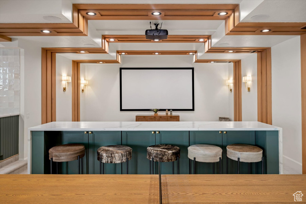 Home theater room with baseboards