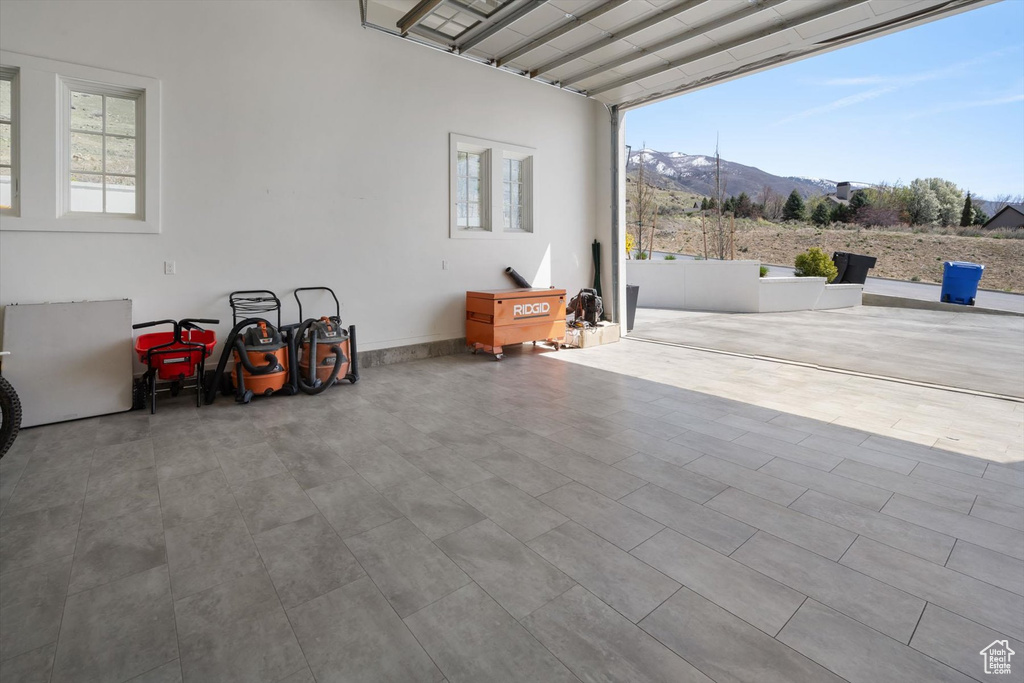 Garage featuring a mountain view