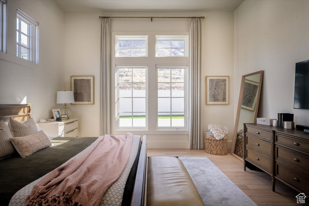 Bedroom with light wood-style flooring