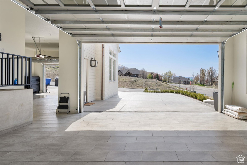 Garage featuring a garage door opener