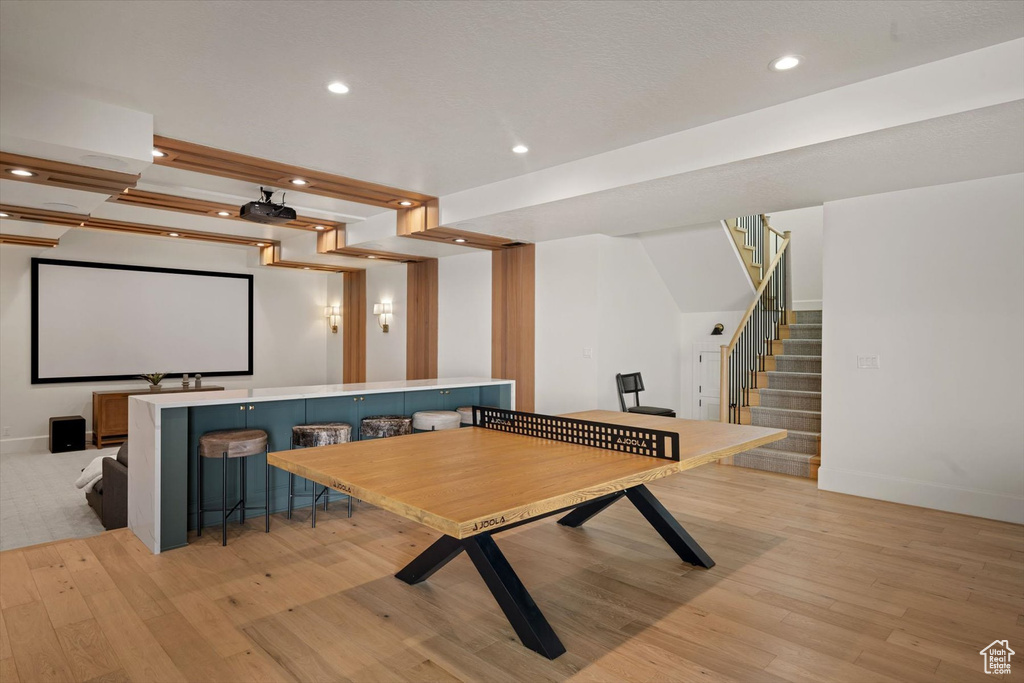 Game room featuring light wood-style flooring, recessed lighting, and baseboards