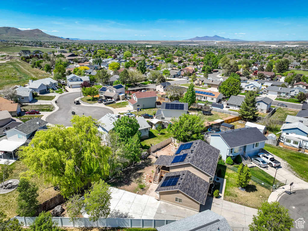 Aerial perspective of suburban area featuring mountains