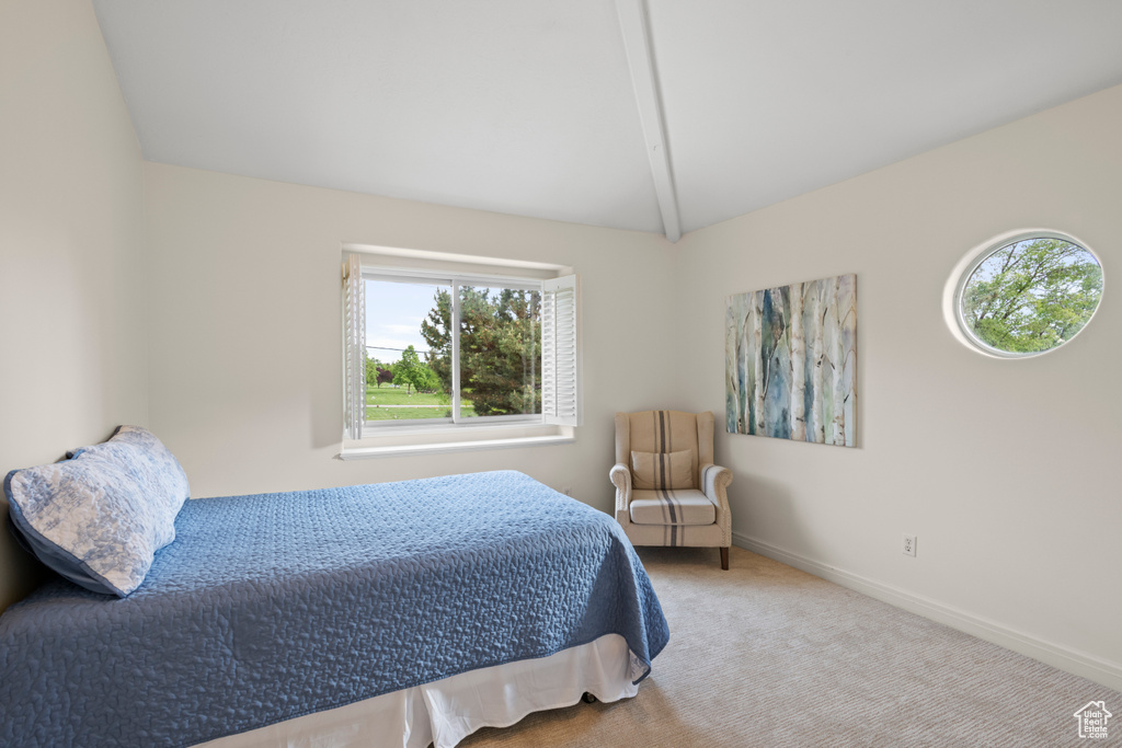Carpeted bedroom with baseboards