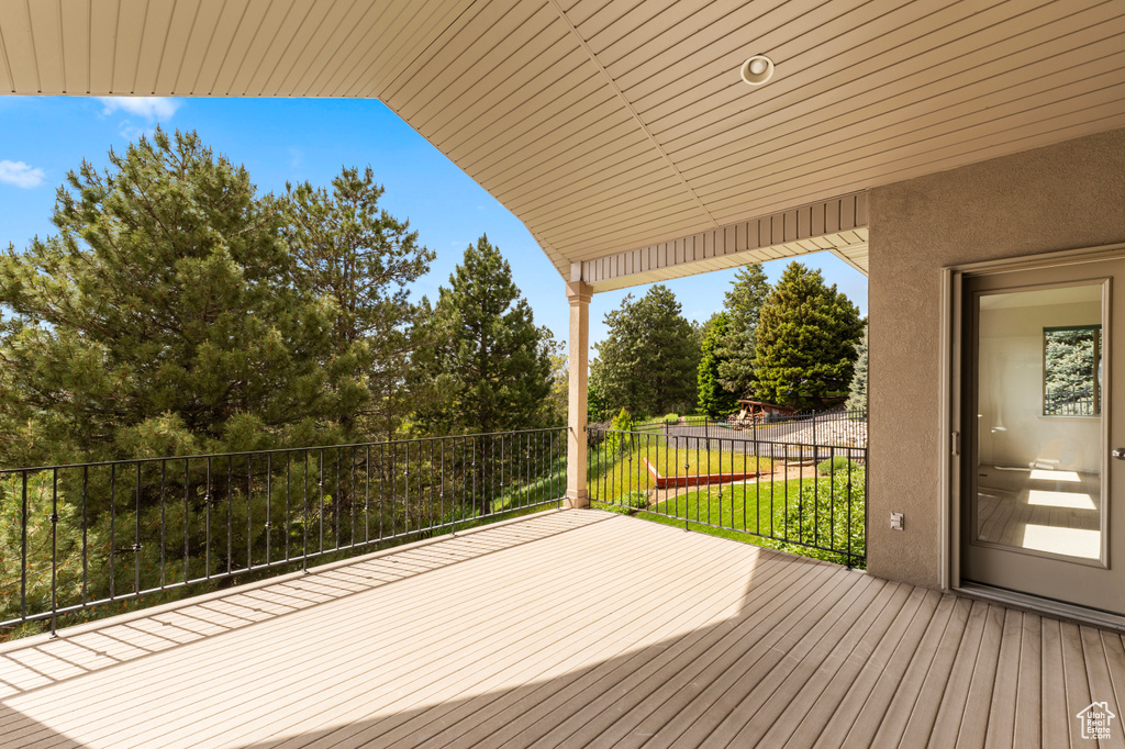 Wooden terrace with view of scattered trees