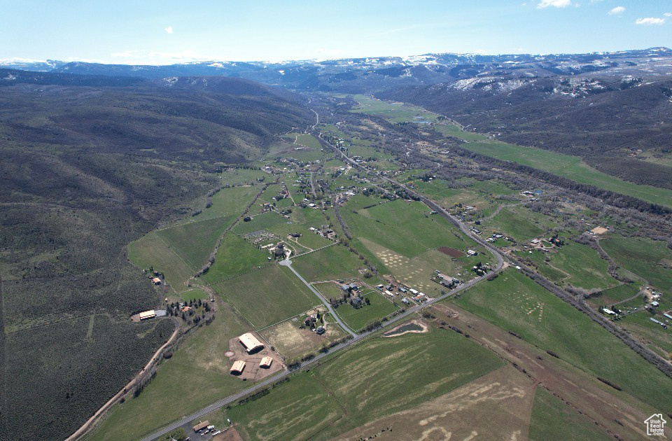 View of property location with a mountainous background and rural landscape