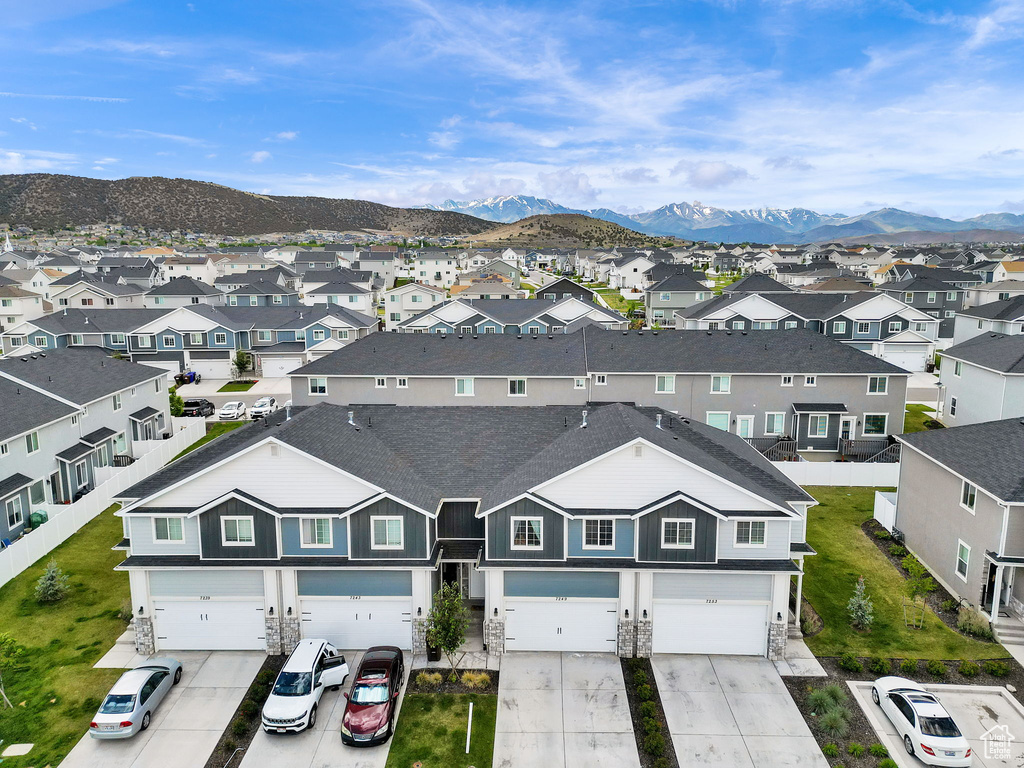 Aerial view of residential area with mountains