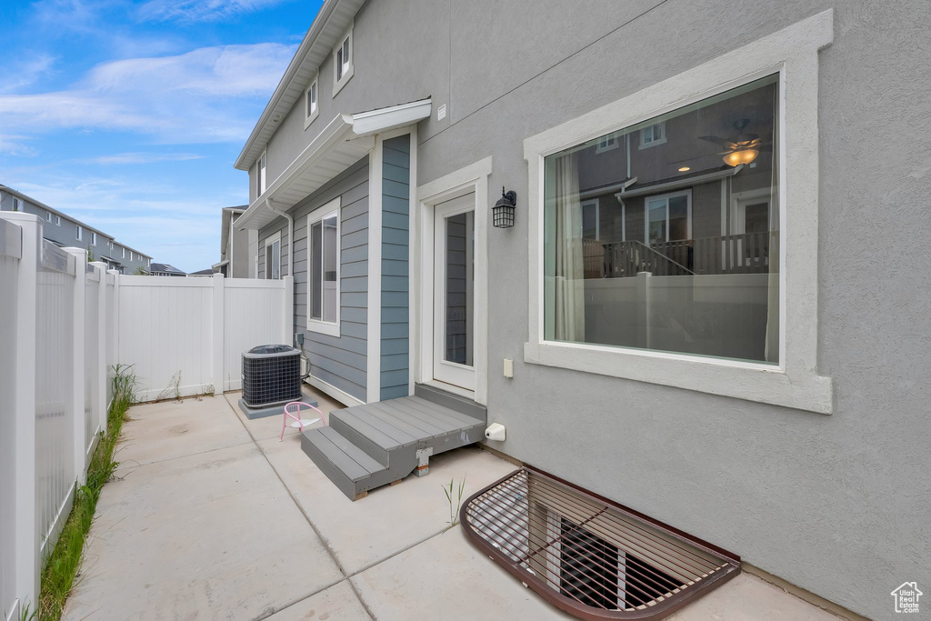 View of patio / terrace with fence and central AC