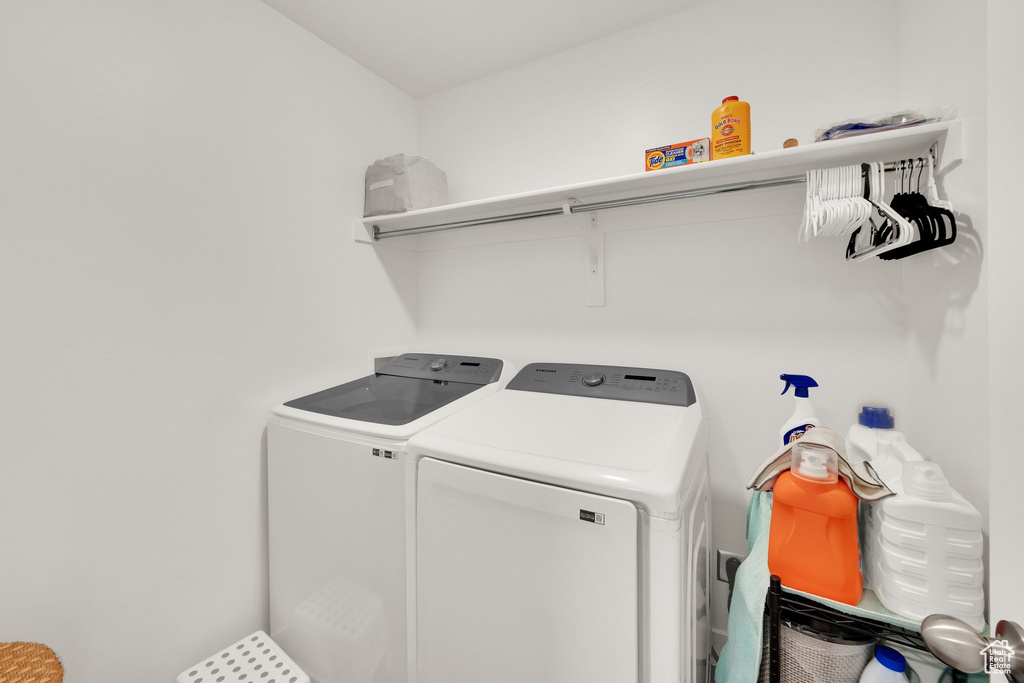 Laundry area featuring independent washer and dryer