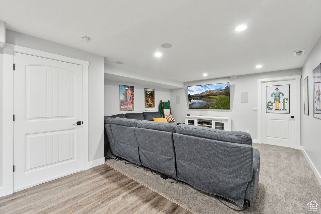 Living area featuring recessed lighting and baseboards