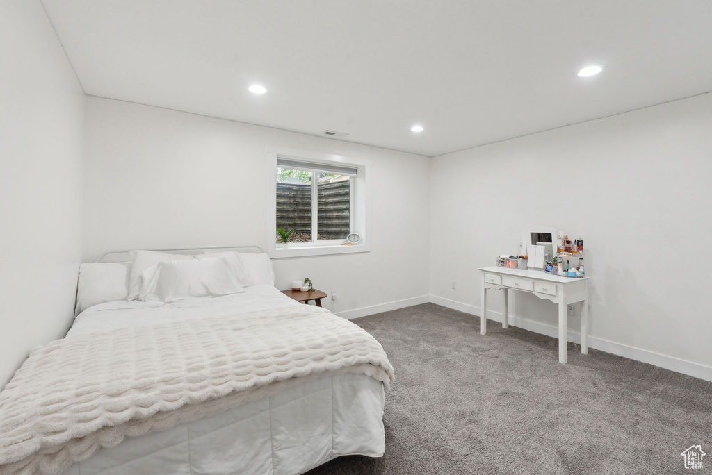 Bedroom featuring carpet floors, recessed lighting, and baseboards