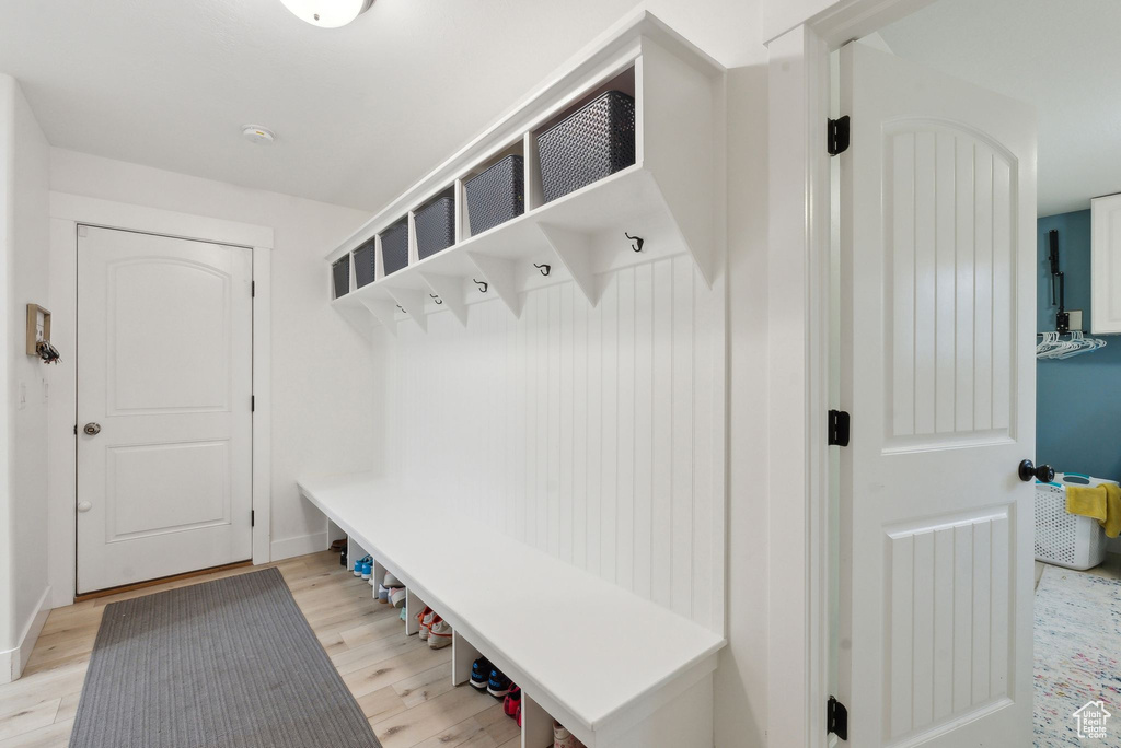 Mudroom featuring light wood-type flooring