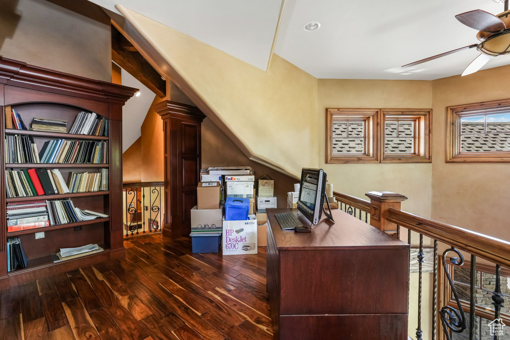 Home office featuring ceiling fan and hardwood / wood-style flooring
