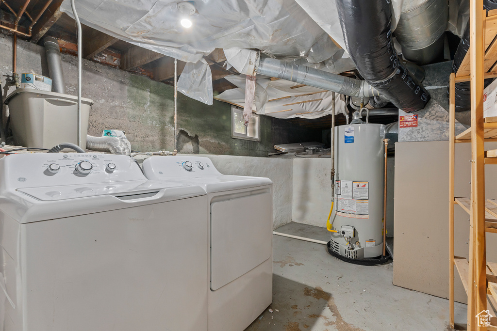 Clothes washing area with gas water heater and washing machine and clothes dryer