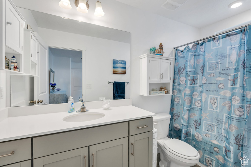 Bathroom with toilet and vanity