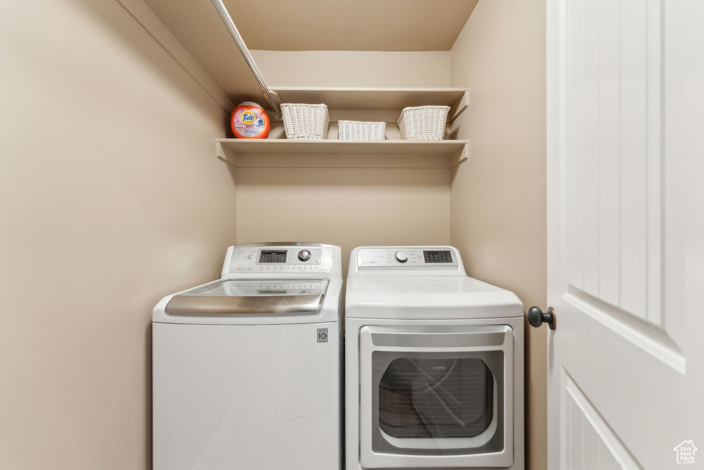 Laundry room featuring washing machine and dryer