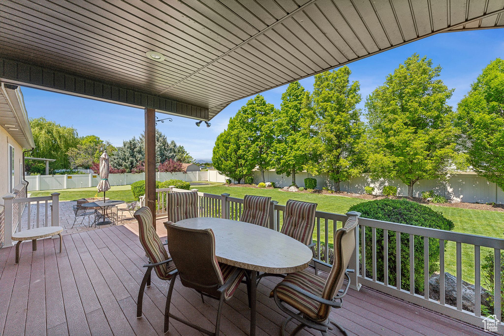 Wooden deck with outdoor dining space
